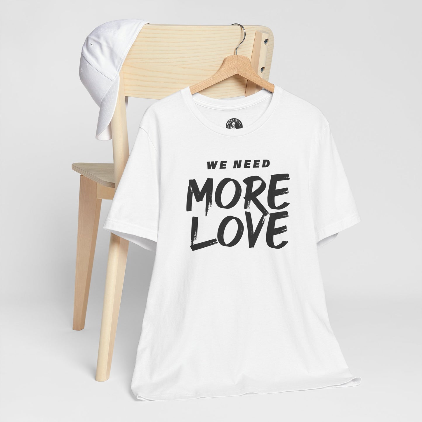 Unisex Jersey Short Sleeve Tee- WE NEED MORE LOVE