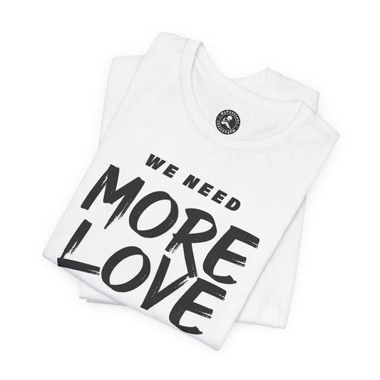 Unisex Jersey Short Sleeve Tee- WE NEED MORE LOVE